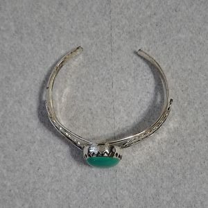 Faux Turquoise cuff bracelet.